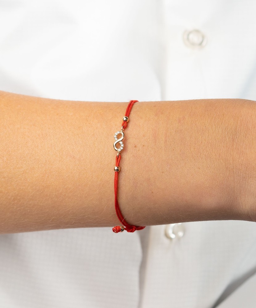 Raudono Siūlo Apyrankė Su Auksiniu Pakabuku "Begalybė" - Perkamiausi - Goldinga