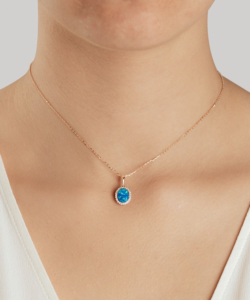 Auksinis pakabukas su opalu ir cirkoniais