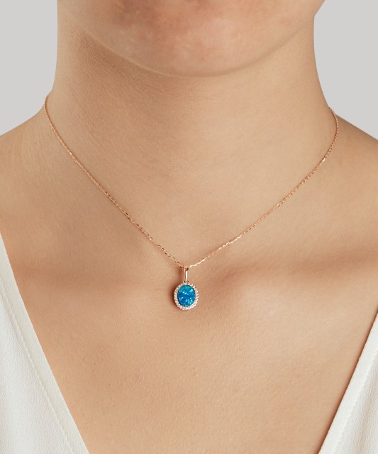 Auksinis pakabukas su opalu ir cirkoniais