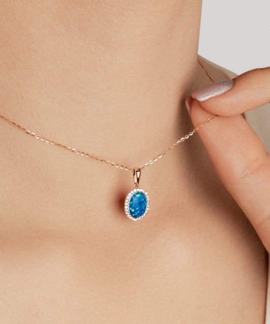 Auksinis pakabukas su opalu ir cirkoniais