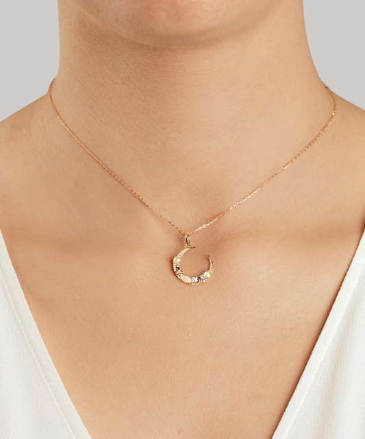 Geltono aukso pakabukas su deimantais, opalais ir topazais