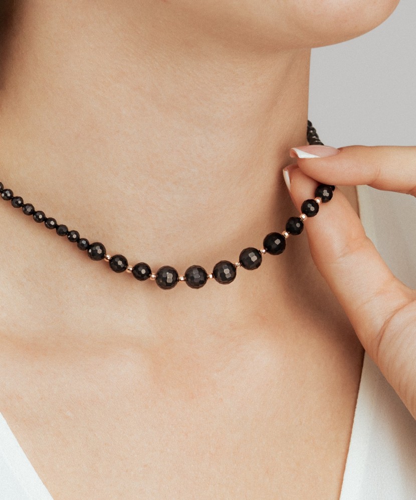 Vėrinys su oniksais ir auksu