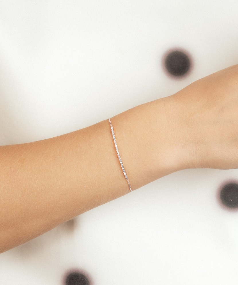 Balto aukso apyrankė su deimantais