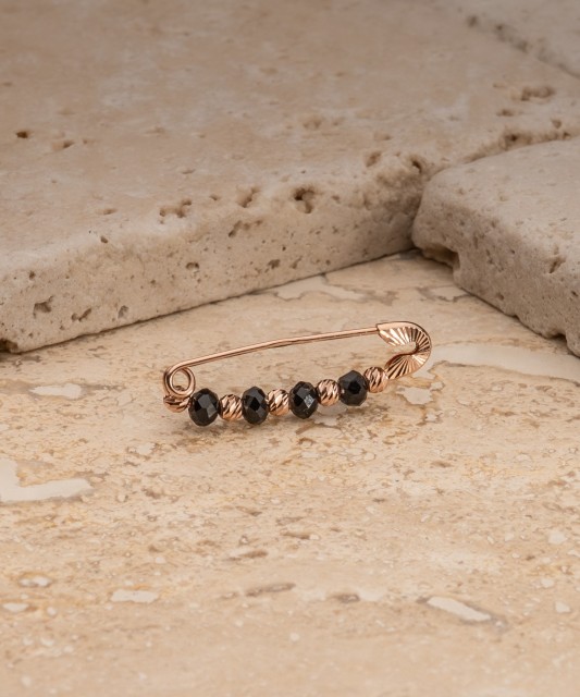 Auksinė sagė su oniksais