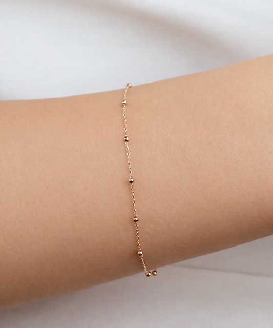 Auksinė apyrankė su cirkonio užsegimu