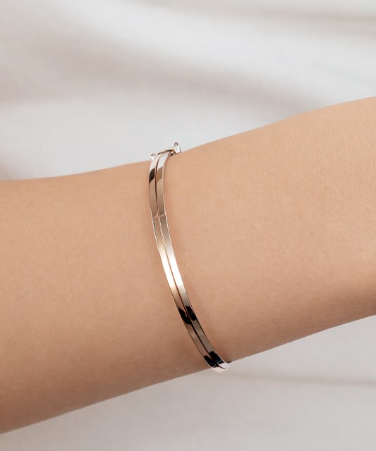 Auksinė kieta apyrankė