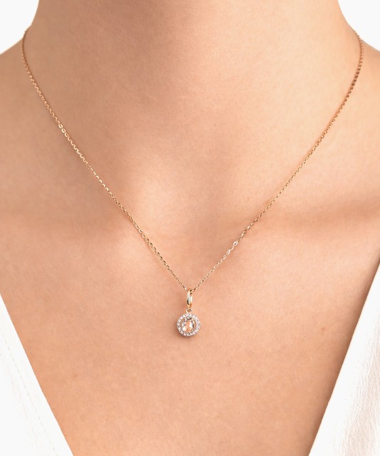 Auksinis pakabukas su baltuoju topazu ir deimantais