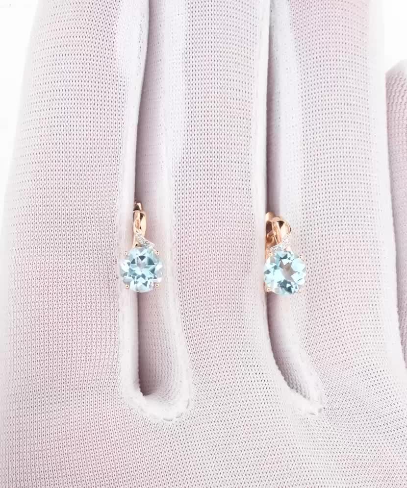 Auksiniai auskarai su deimantais ir topazais