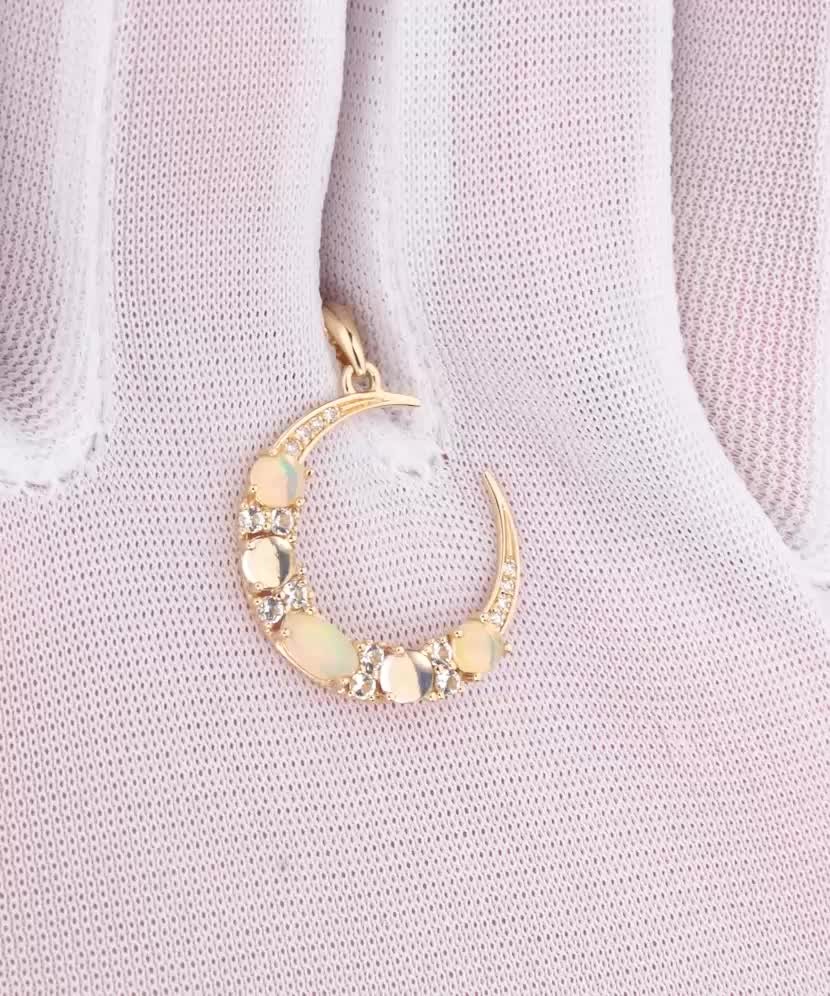 Geltono aukso pakabukas su deimantais, opalais ir topazais