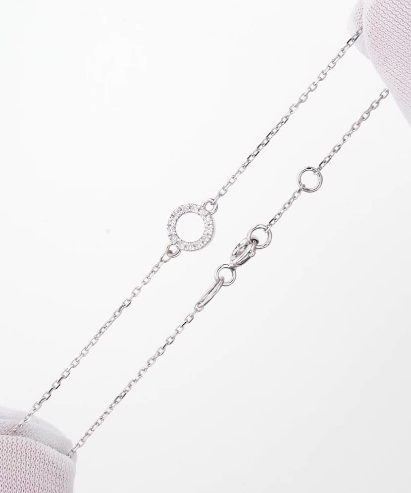 Balto aukso apyrankė su deimantais