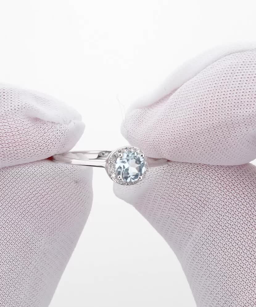 Balto aukso žiedas su topazu ir deimantais