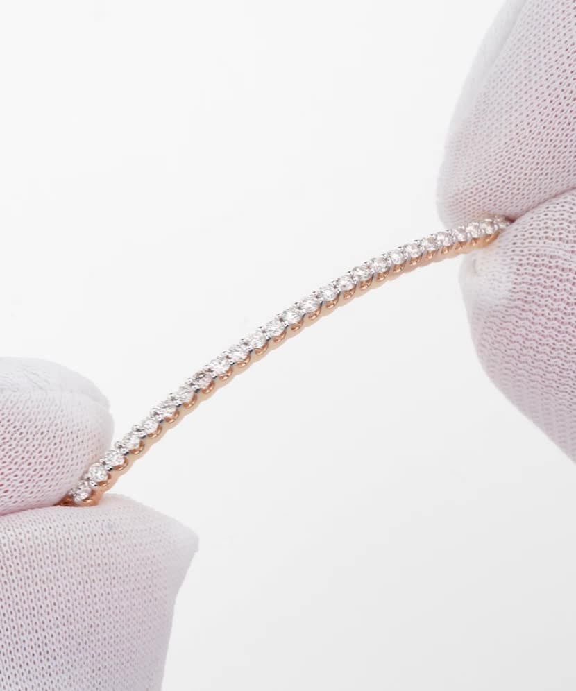 Auksinė apyrankė su deimantais