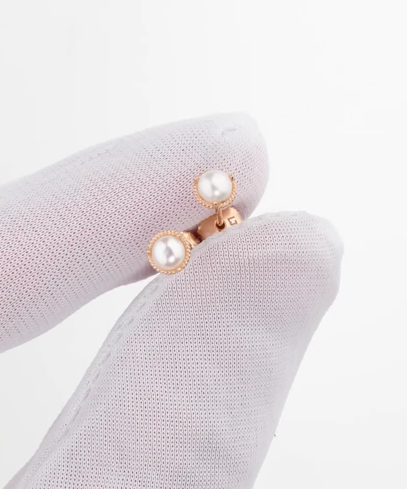 Auksiniai auskarai su perlais