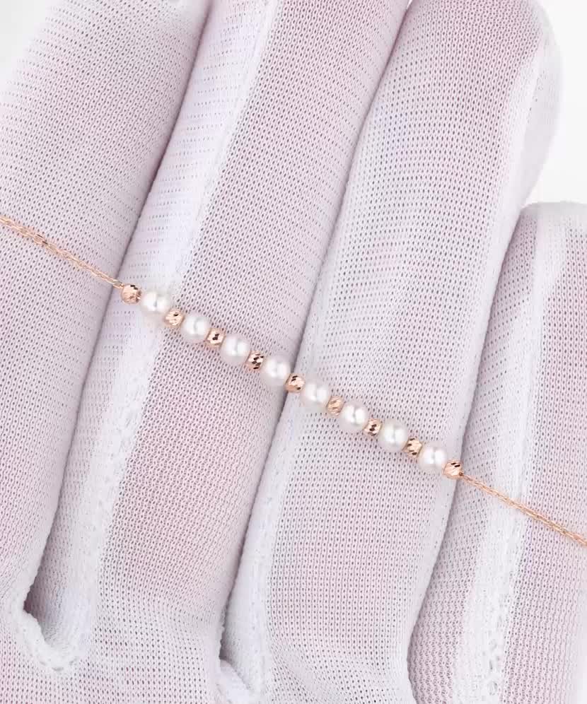 Auksinė apyrankė su perlais