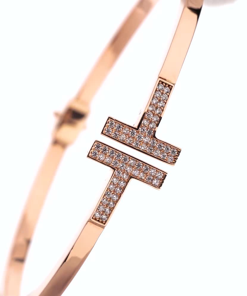 Auksinė kieta apyrankė su cirkoniais  - Goldinga