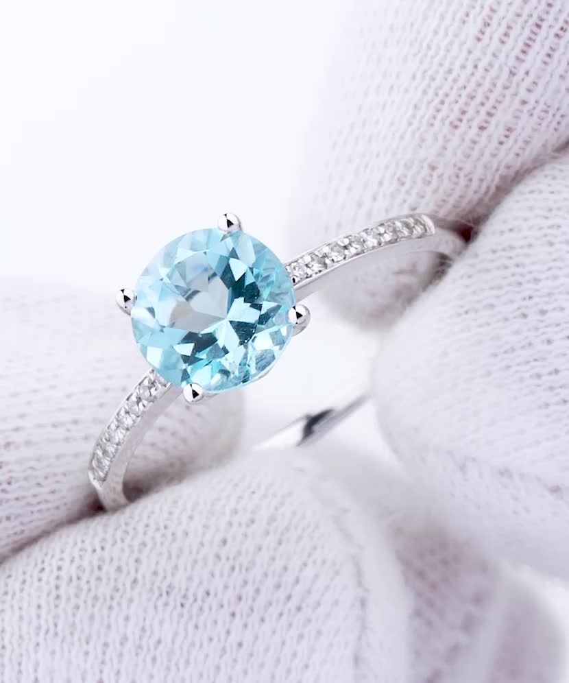 Balto aukso žiedas su topazu ir deimantais  - Goldinga